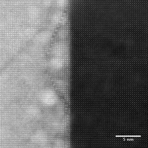 Bi0.5Mn0.5FeO3 film (left hand side, lighter contrast), epitaxially grown on a strontium titanate (SrTiO3 ) single crystal substrate